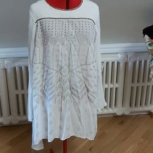 White tunic with gold beading